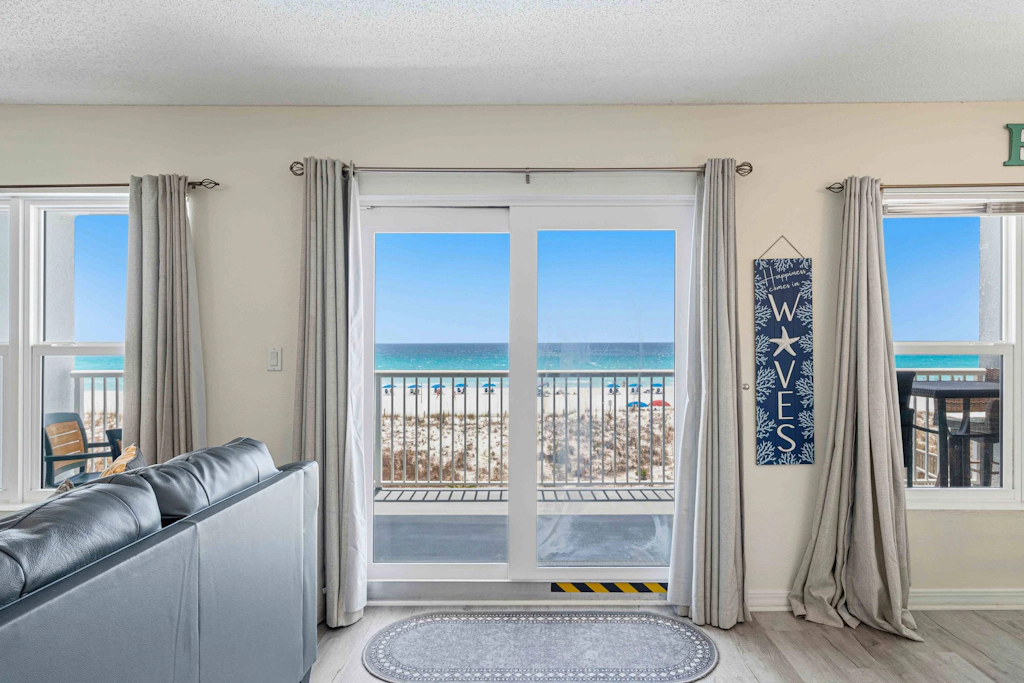 Beachfront condo with ocean & pool views, beach setup included, drive to dining