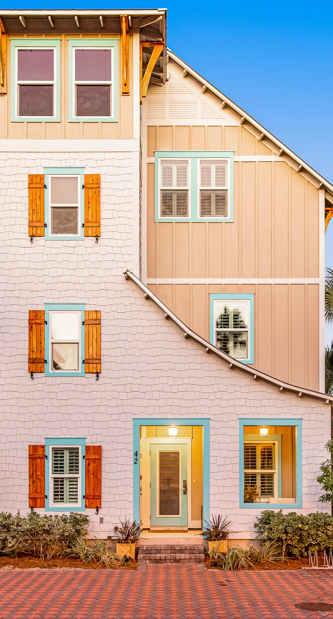 Coastal retreat steps from pool with furnished balcony, bikes