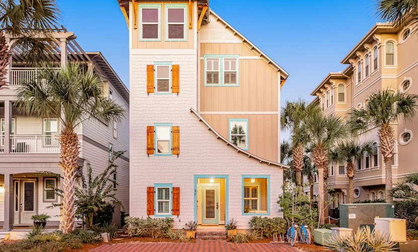 Coastal retreat steps from pool with furnished balcony, bikes
