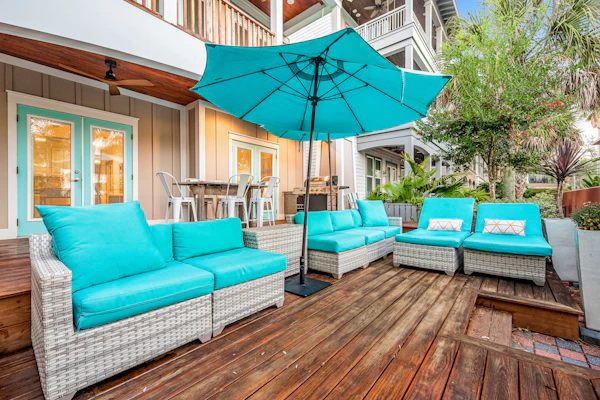 Coastal retreat steps from pool with furnished balcony, bikes