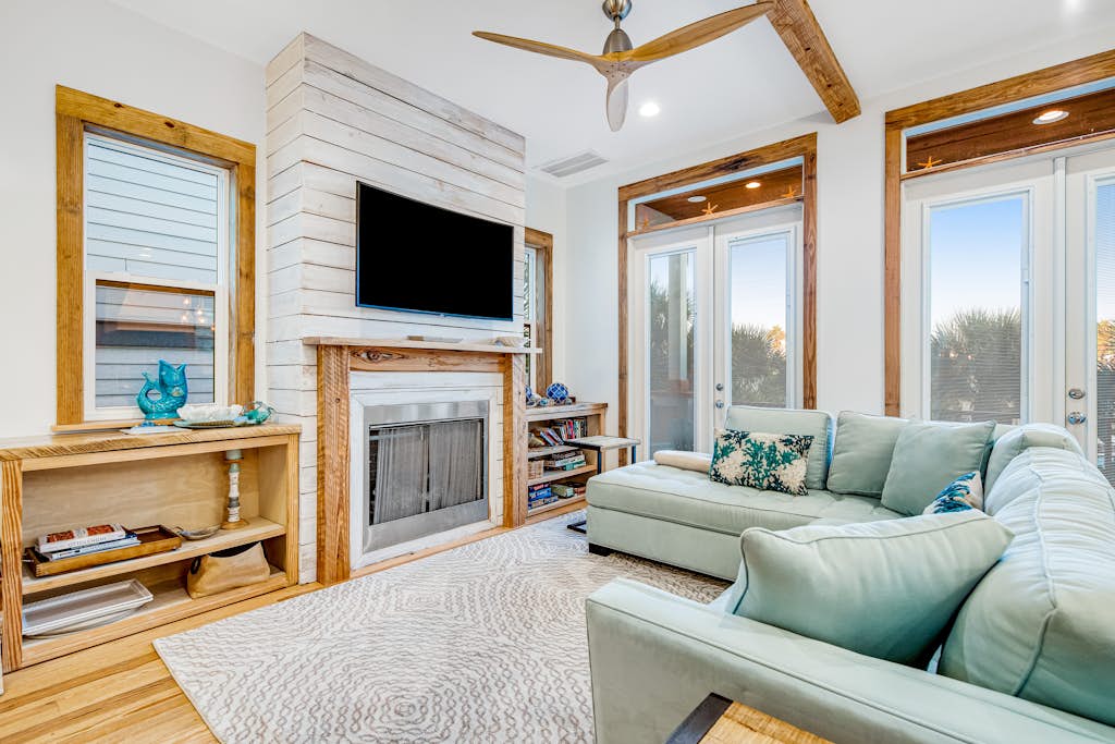 Coastal retreat steps from pool with furnished balcony, bikes