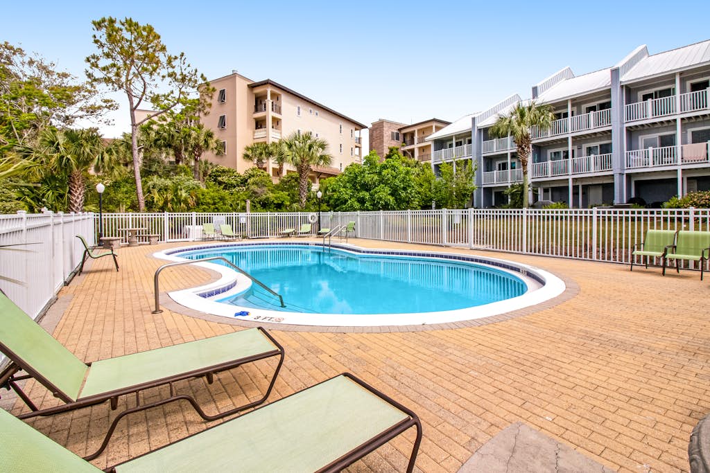 Santa Rosa retreat steps from private beach with pool & balcony