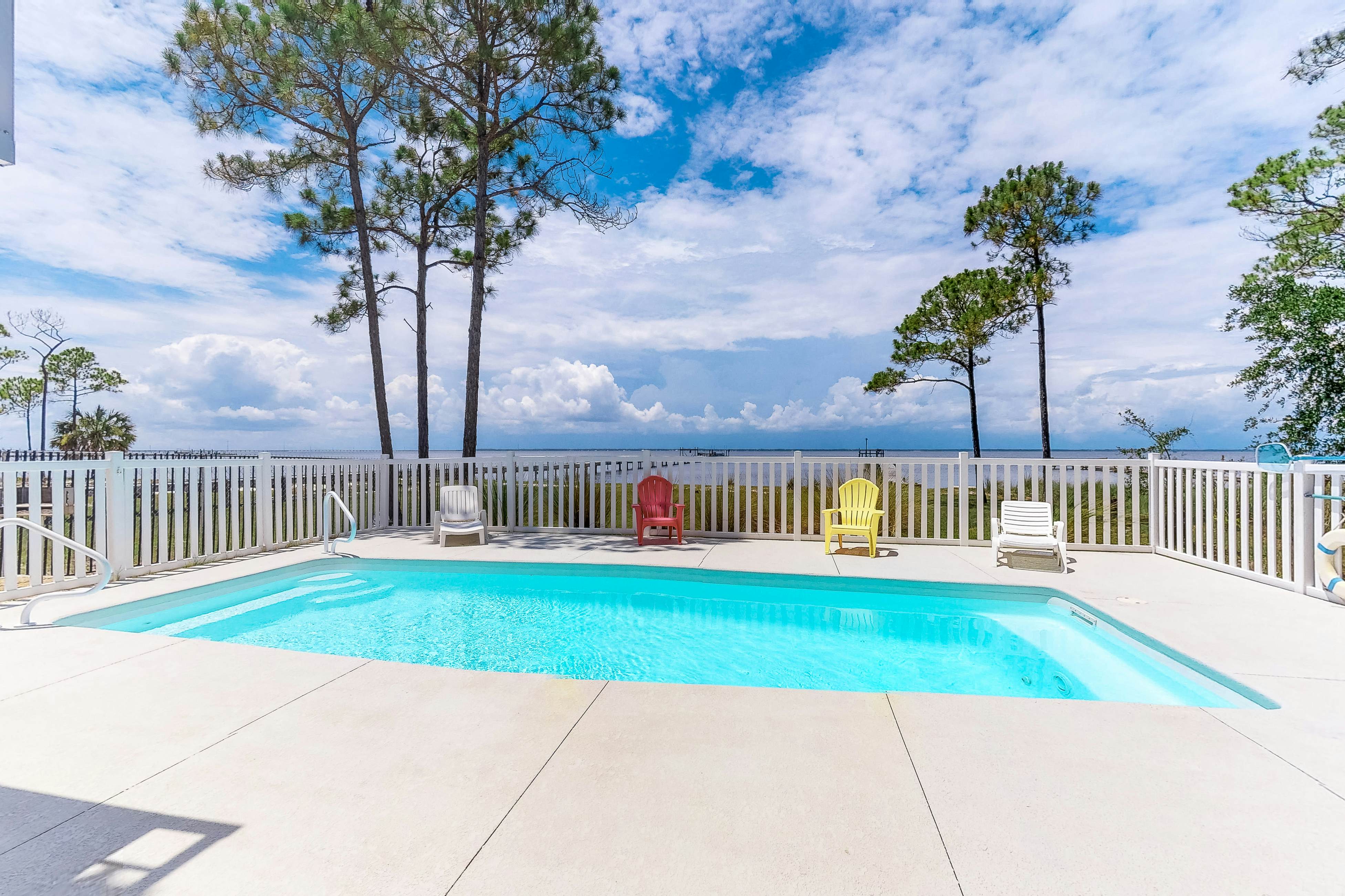 Bayfront home on the East End with private heated pool, fishing pier & deck