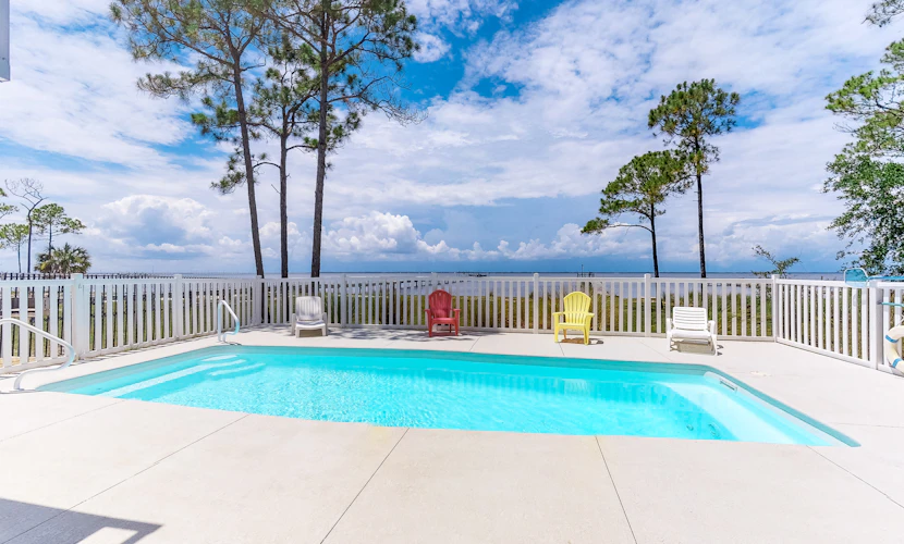 Bayfront home on the East End with private heated pool, fishing pier & deck