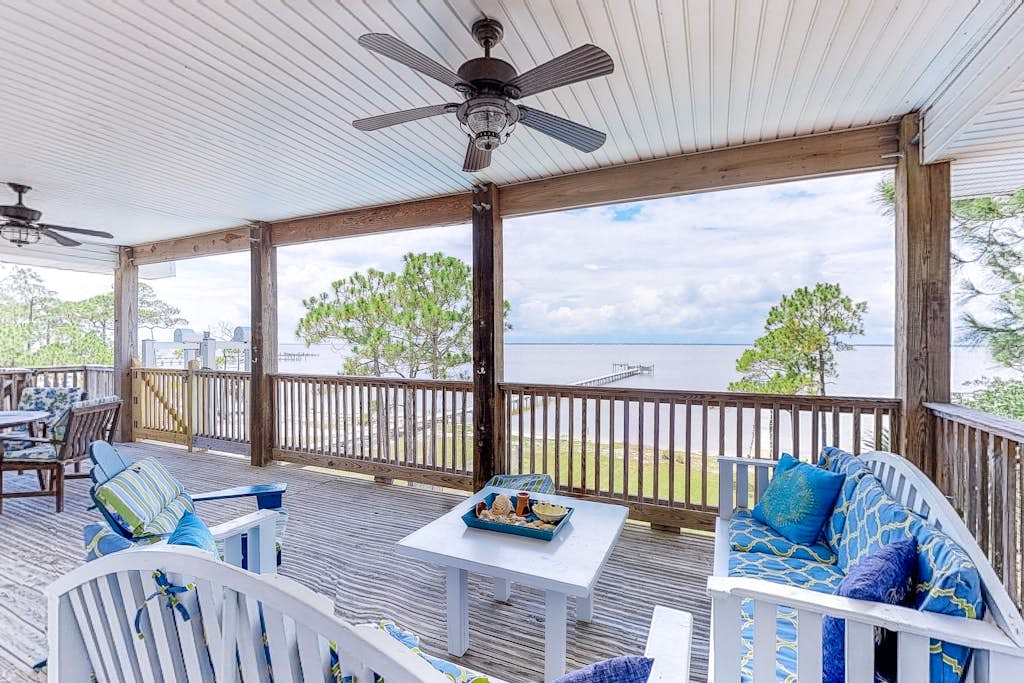 Bayfront home on the East End with private heated pool, fishing pier & deck