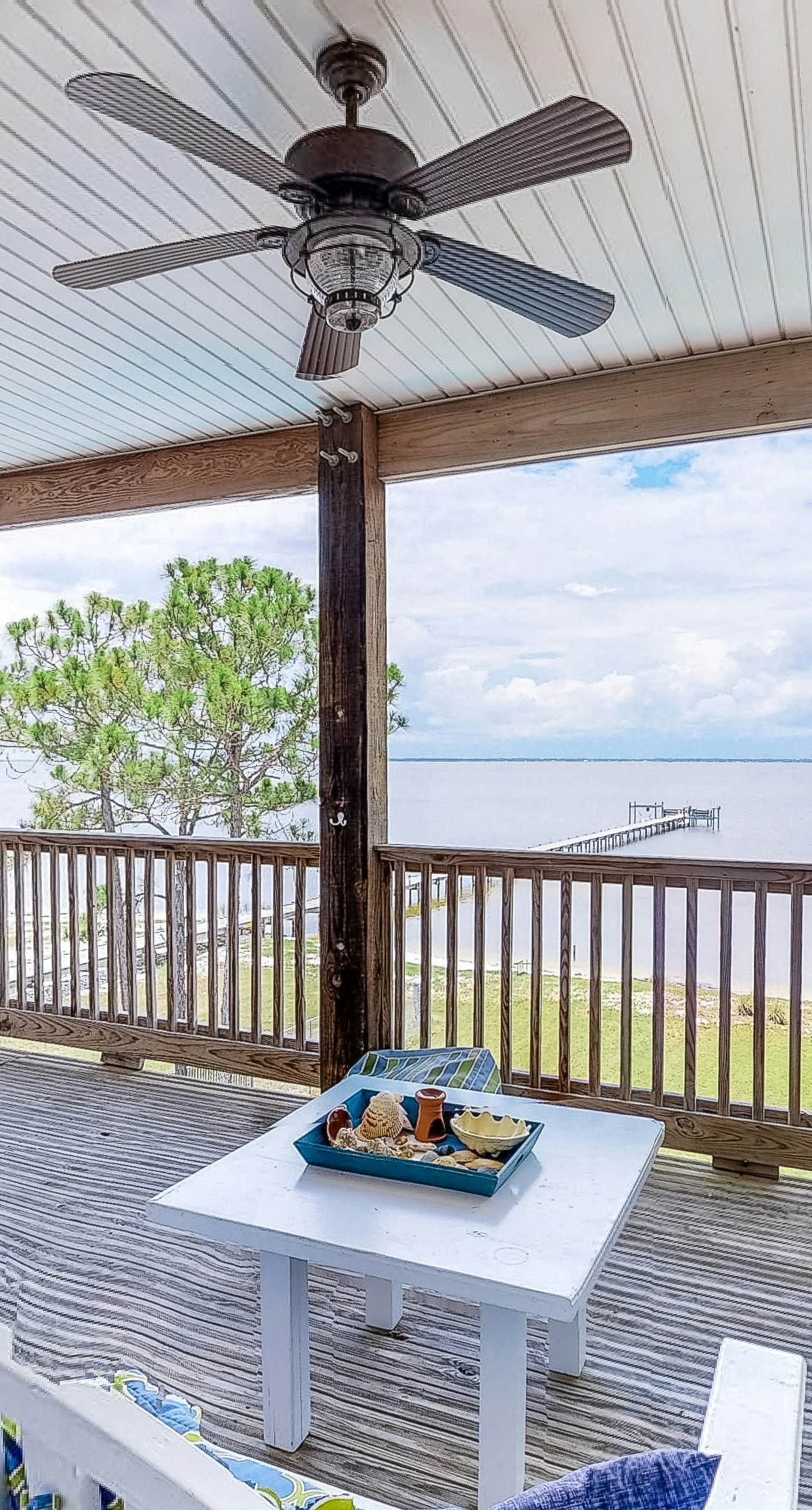 Bayfront home on the East End with private heated pool, fishing pier & deck