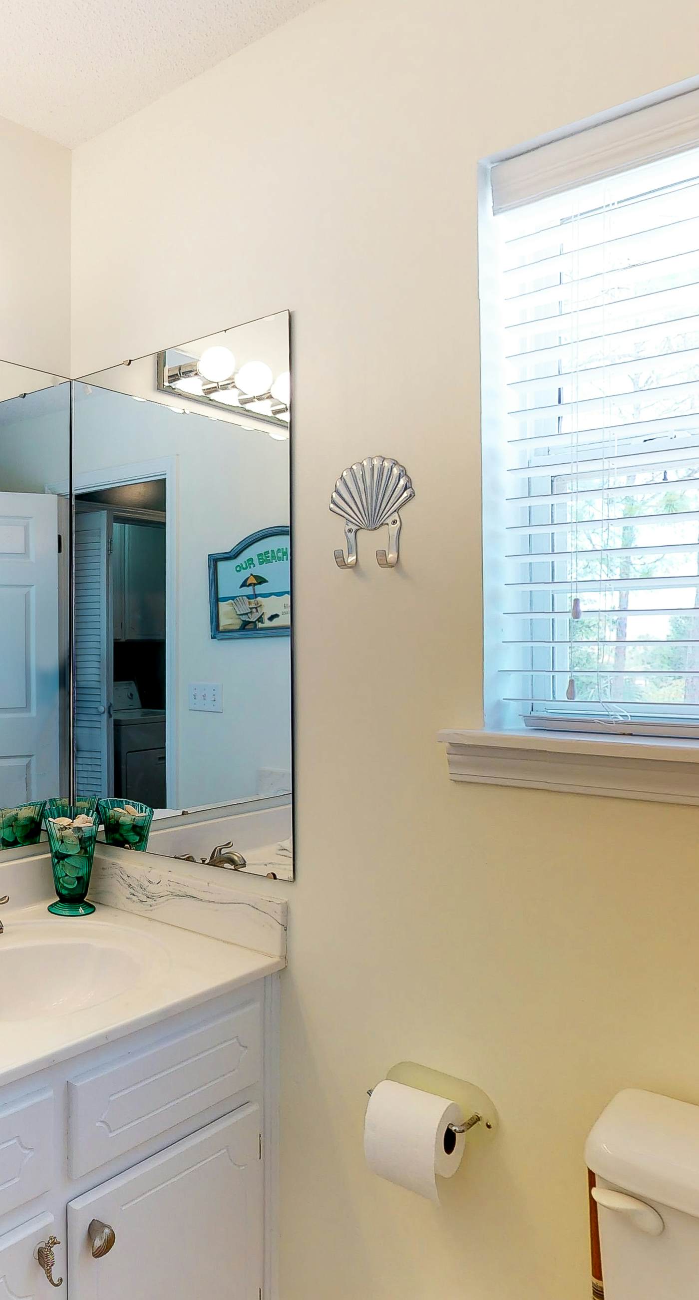 Bayfront home on the East End with private heated pool, fishing pier & deck