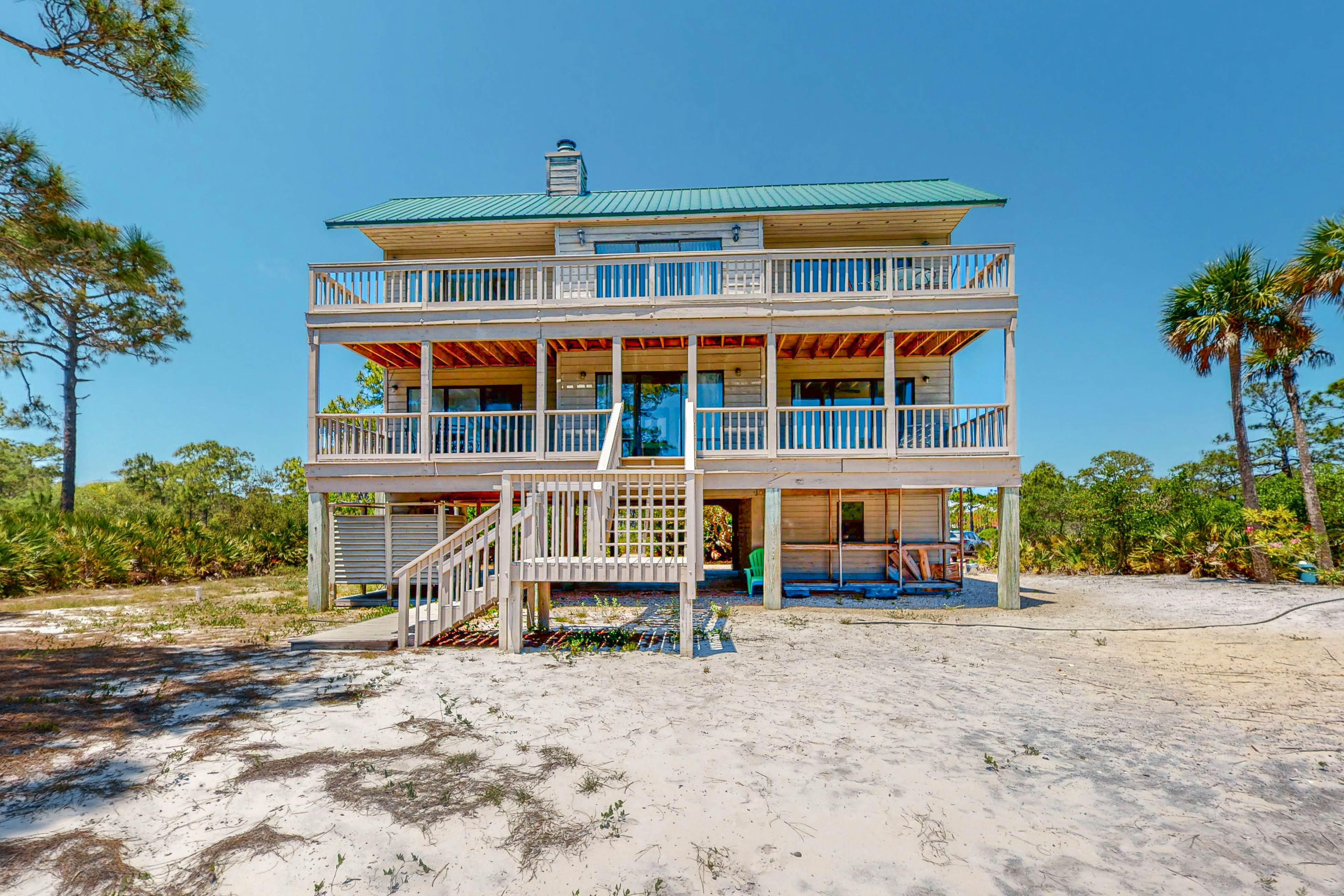 Dog-friendly home near the beach with beach gear, on-site pool & tennis