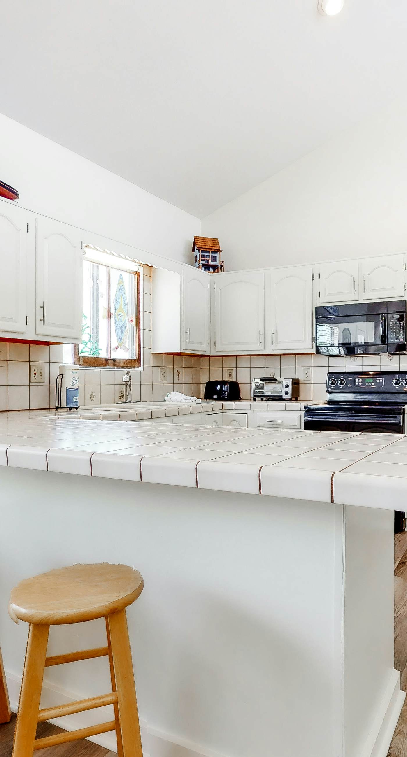 Dog-friendly home near the beach with beach gear, on-site pool & tennis