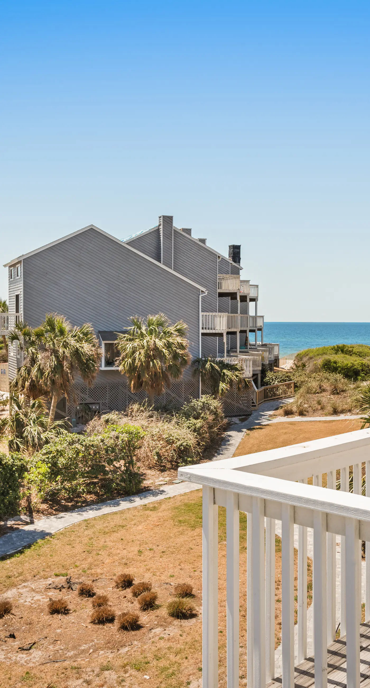 Dog-friendly townhome in private community with pool - near beach