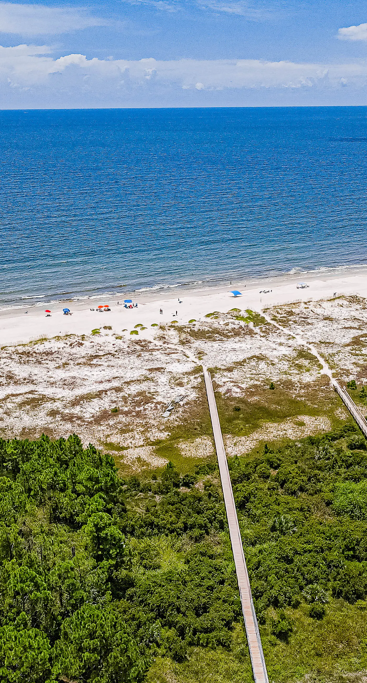 Dog-friendly townhome in private community with pool - near beach