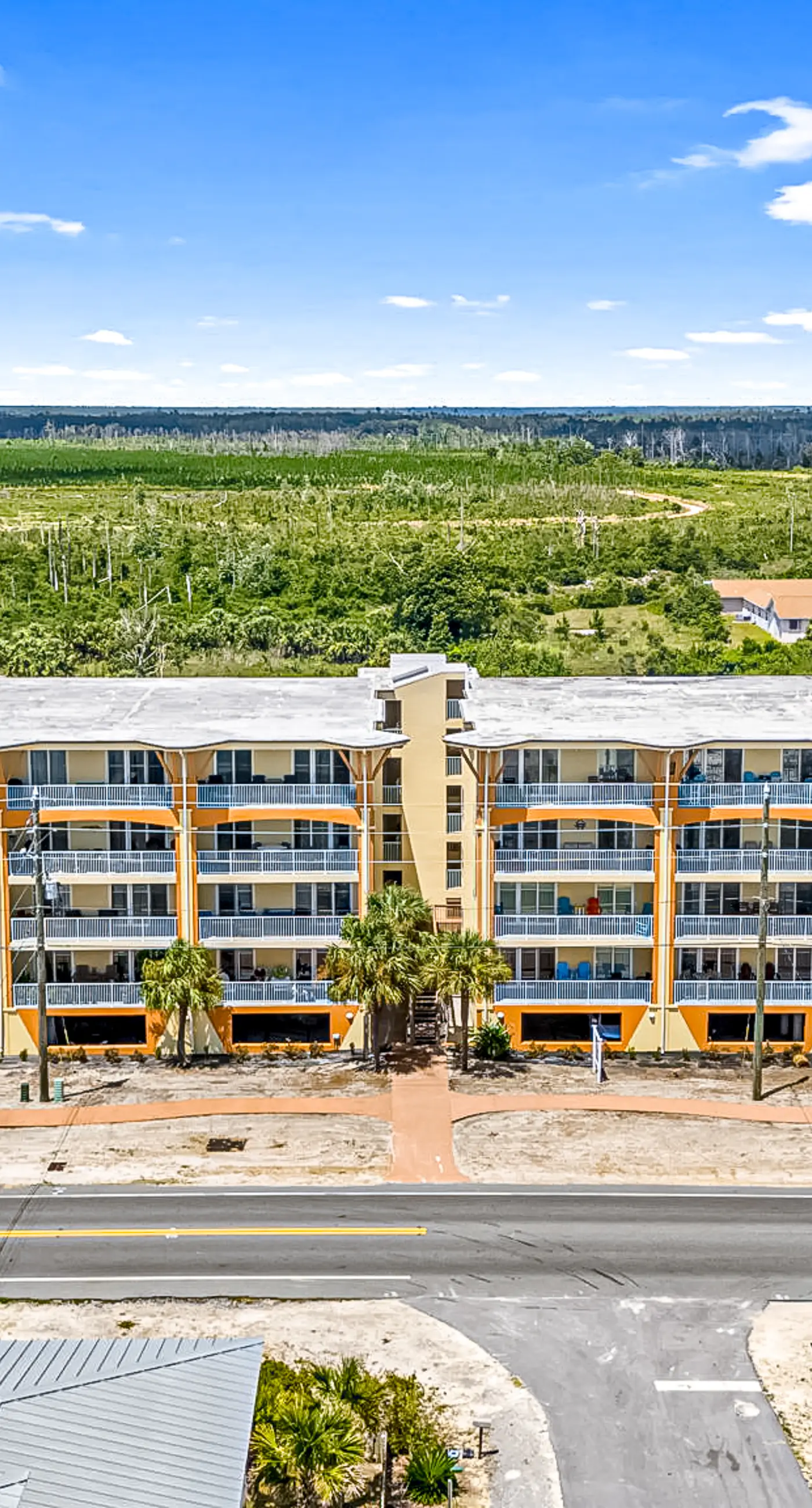 Fourth Floor Condo with Shared Pool, Ocean View, High-Speed WiFi, & Washer/Dryer