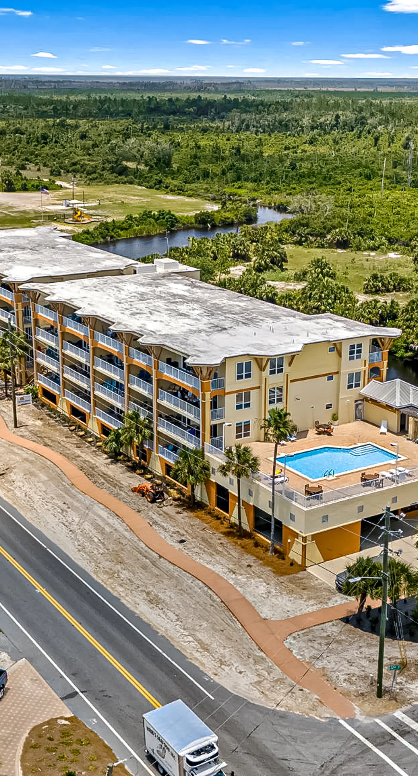 Fourth Floor Condo with Shared Pool, Ocean View, High-Speed WiFi, & Washer/Dryer