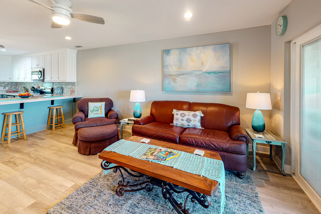 Updated home across from beach with firepit, sunroom, & fast WiFi - snowbirds OK