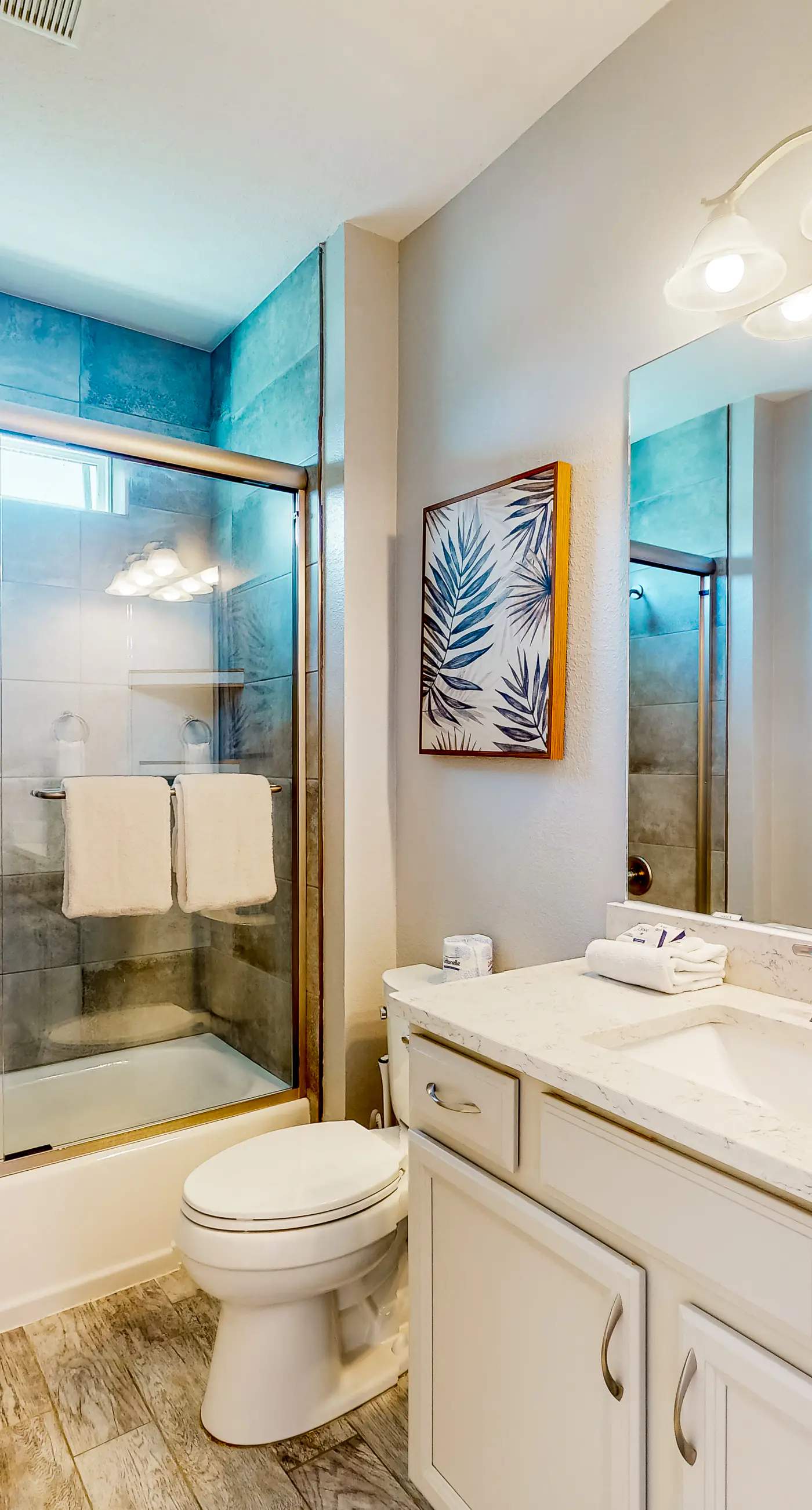 Coastal dog-friendly cottage with pool access, grill, board games, W/D, & AC