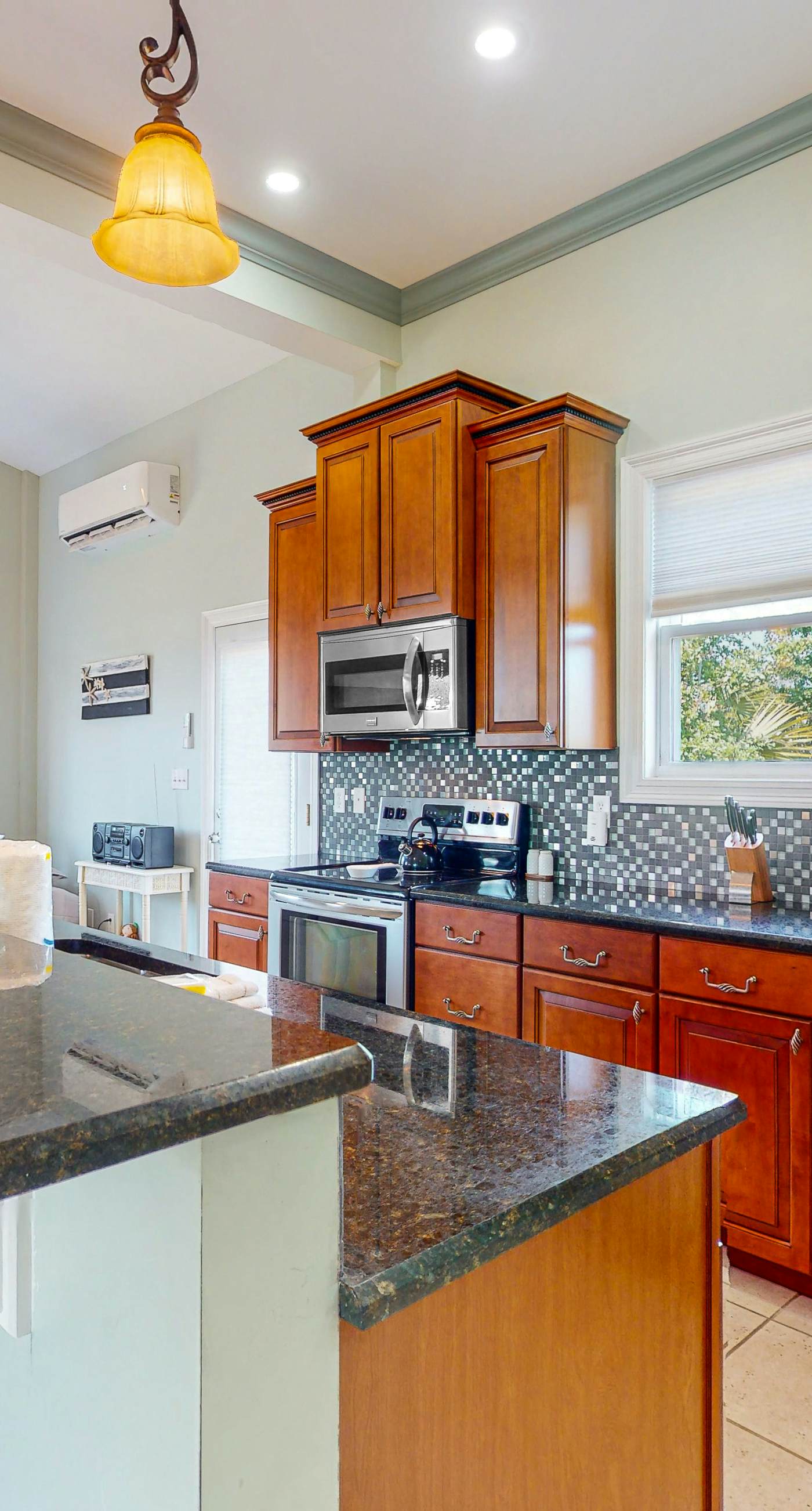 Dog-friendly cottage near the beach with patio, grill, washer/dryer, partial AC