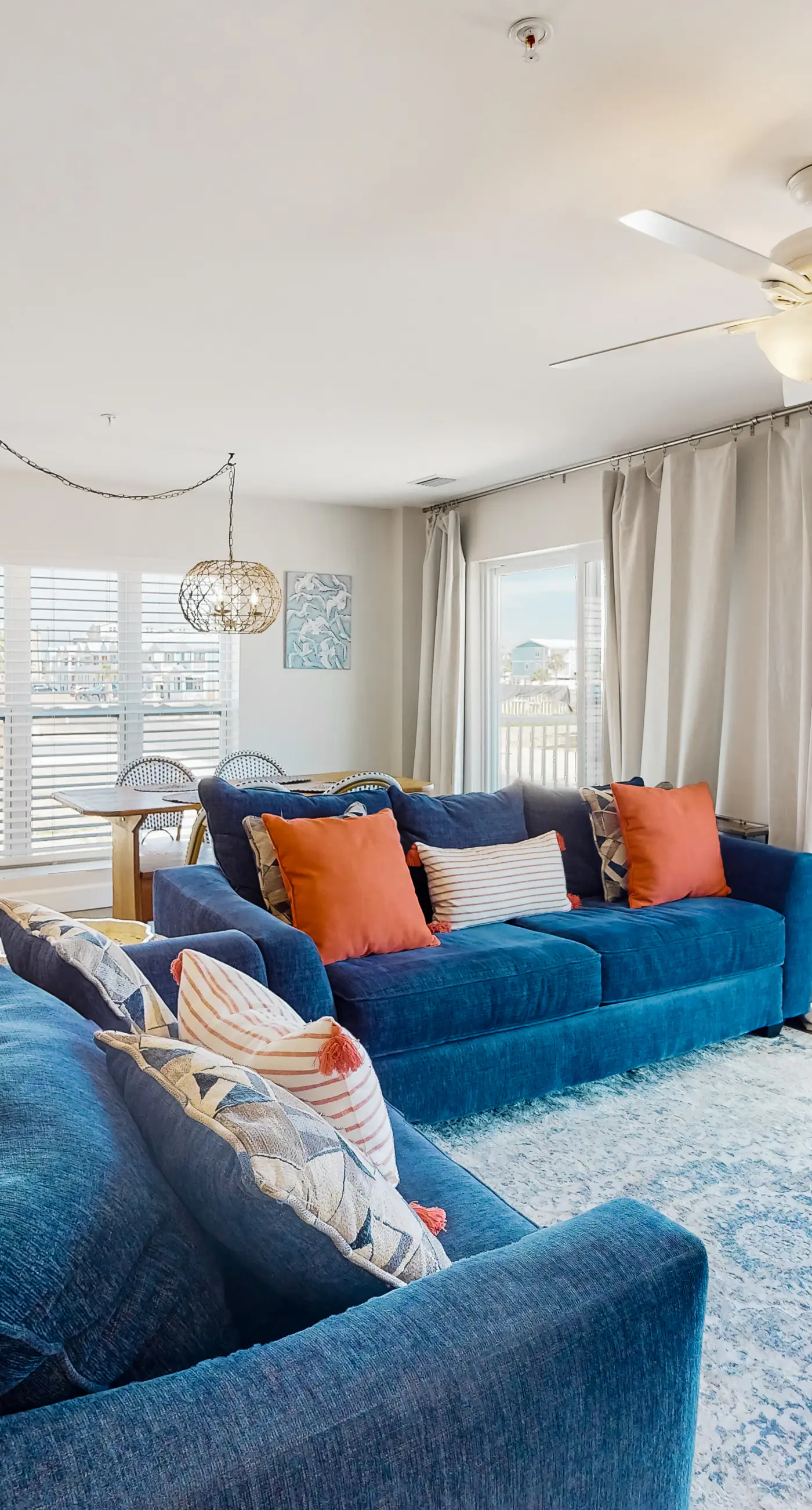 2nd-floor ocean-view condo with balcony, washer/dryer, & AC - close to the beach