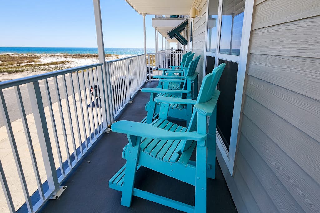 2nd-floor ocean-view condo with balcony, washer/dryer, & AC - close to the beach