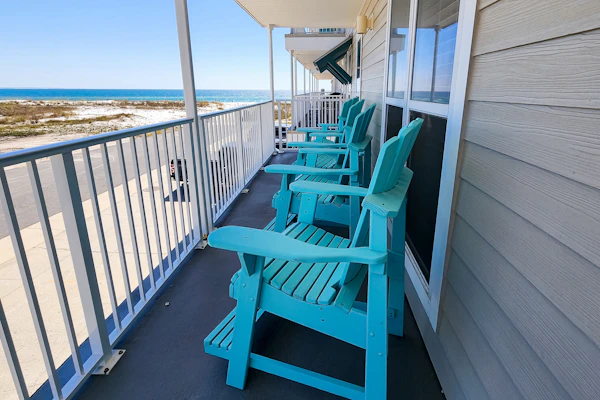 2nd-floor ocean-view condo with balcony, washer/dryer, & AC - close to the beach