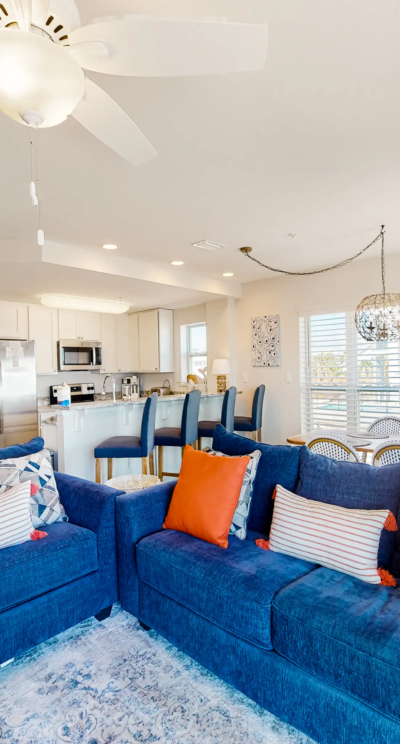 2nd-floor ocean-view condo with balcony, washer/dryer, & AC - close to the beach