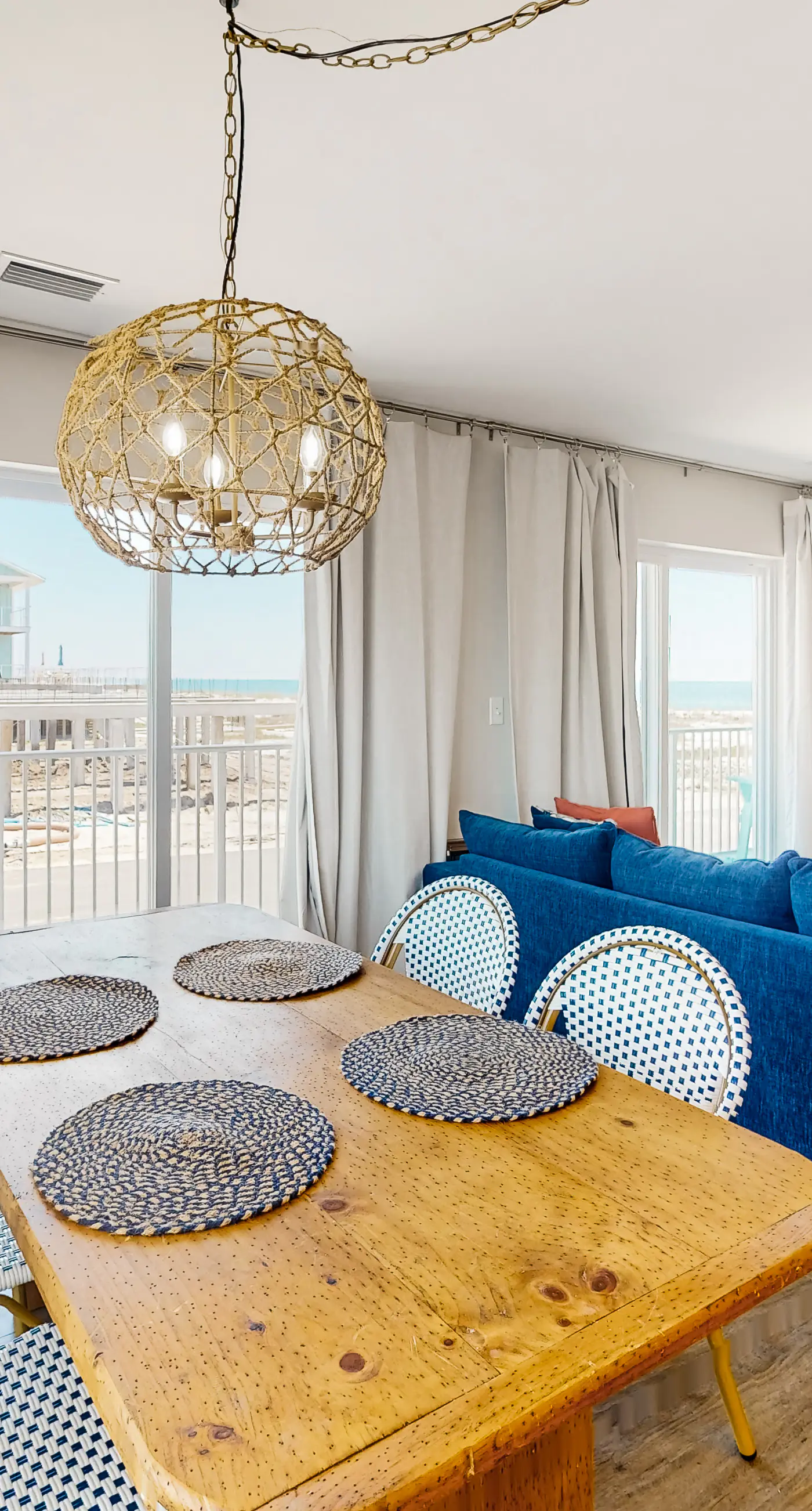 2nd-floor ocean-view condo with balcony, washer/dryer, & AC - close to the beach