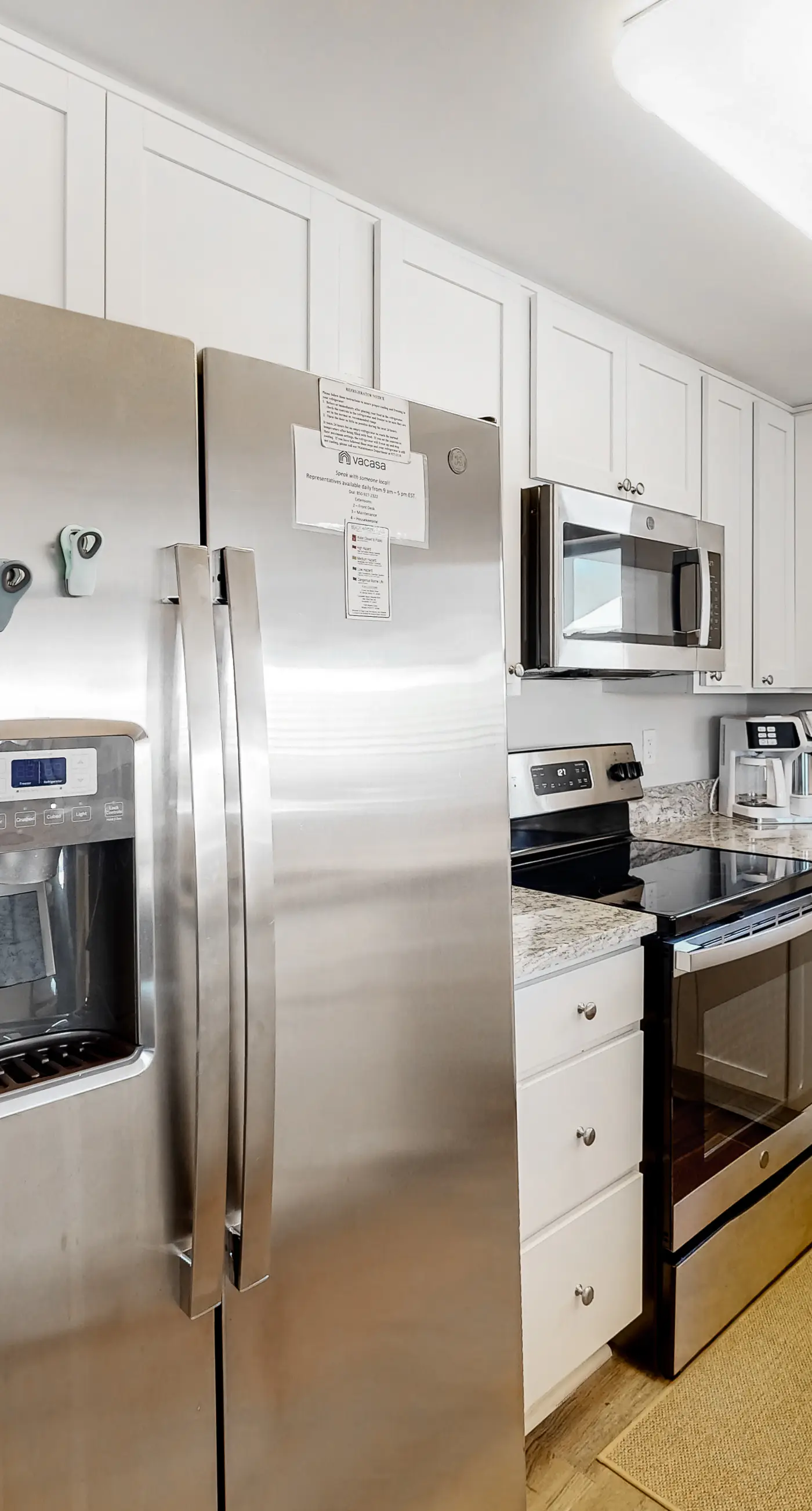 2nd-floor ocean-view condo with balcony, washer/dryer, & AC - close to the beach