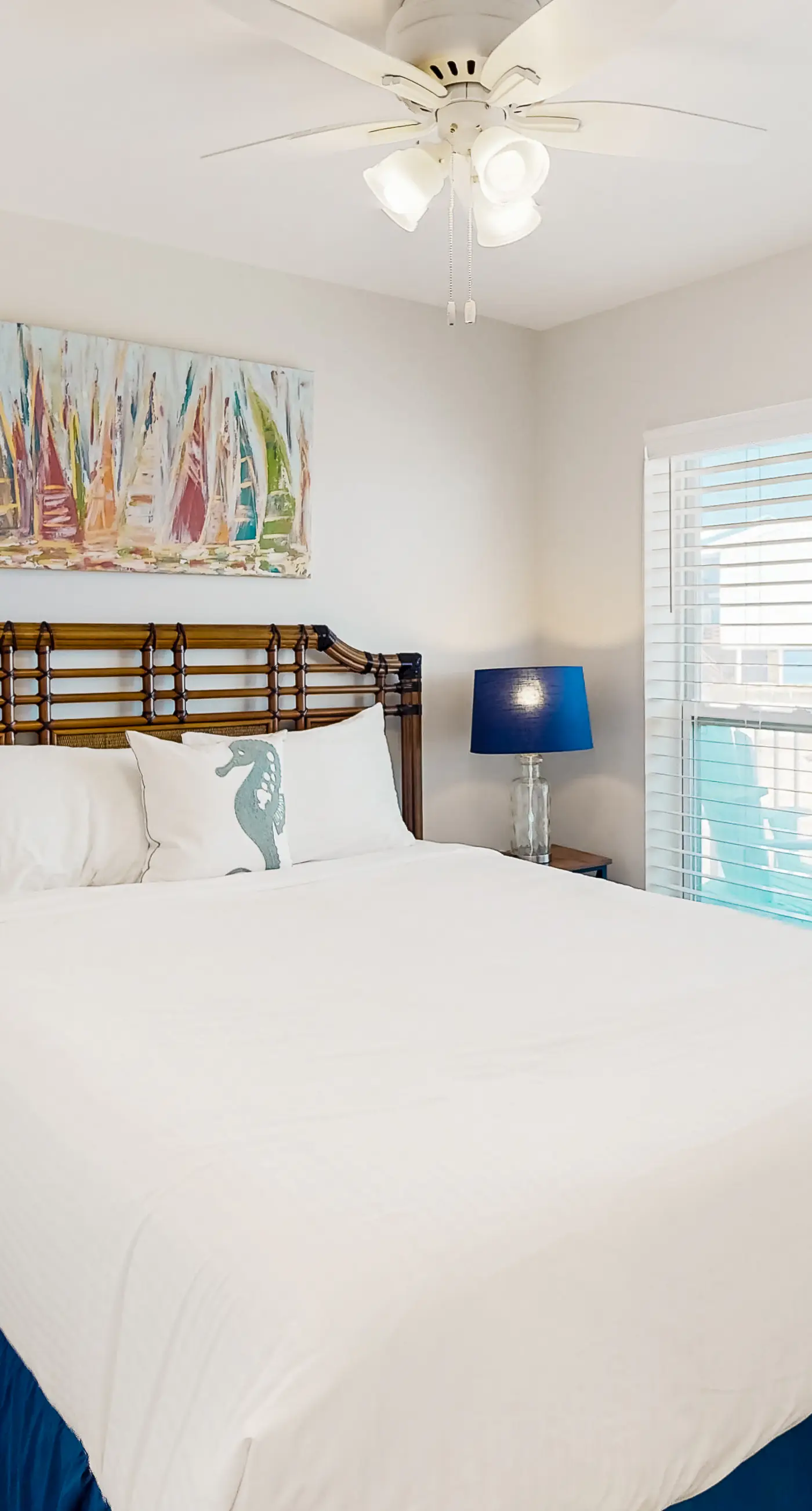 2nd-floor ocean-view condo with balcony, washer/dryer, & AC - close to the beach