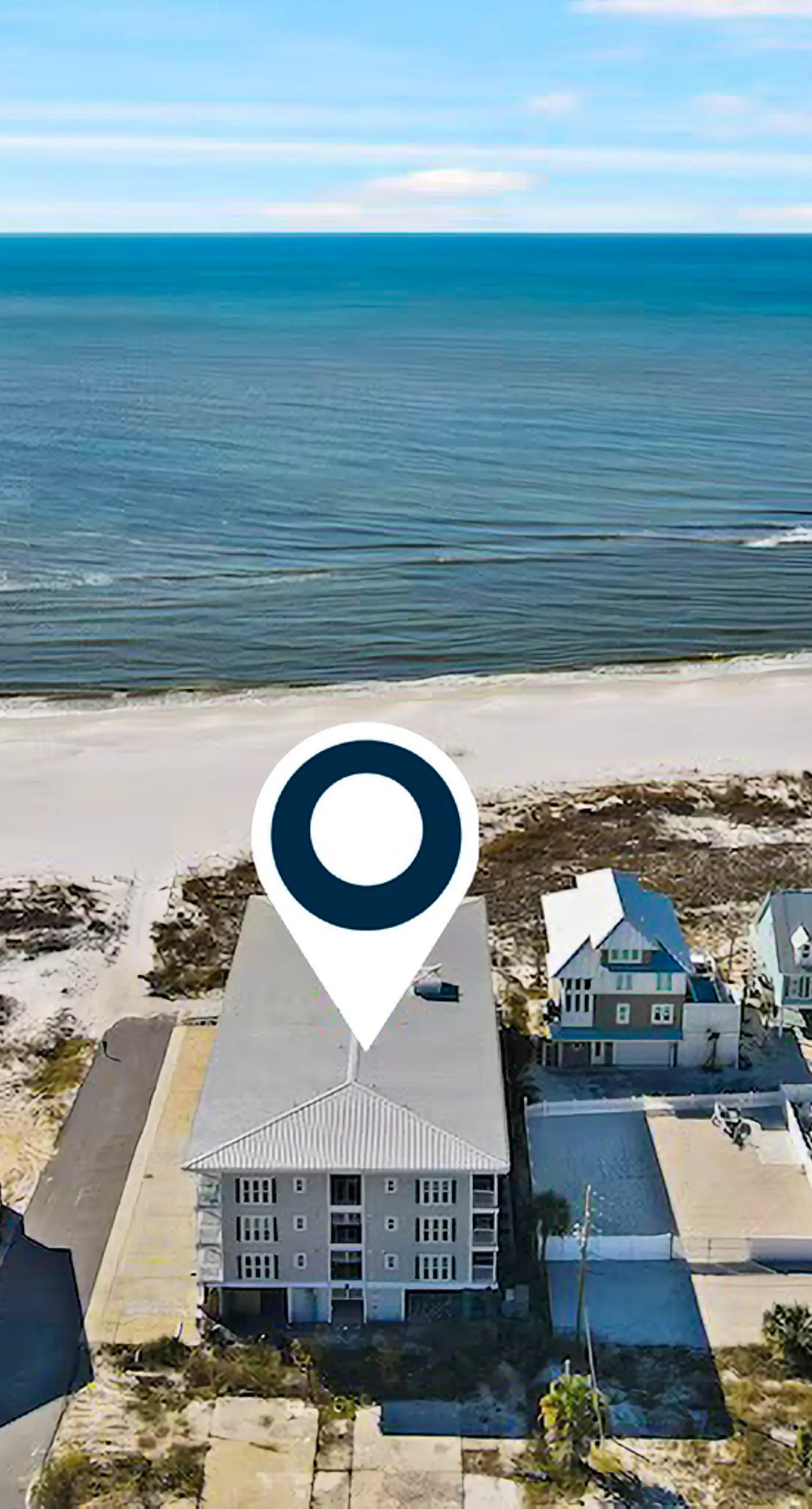 2nd-floor ocean-view condo with balcony, washer/dryer, & AC - close to the beach