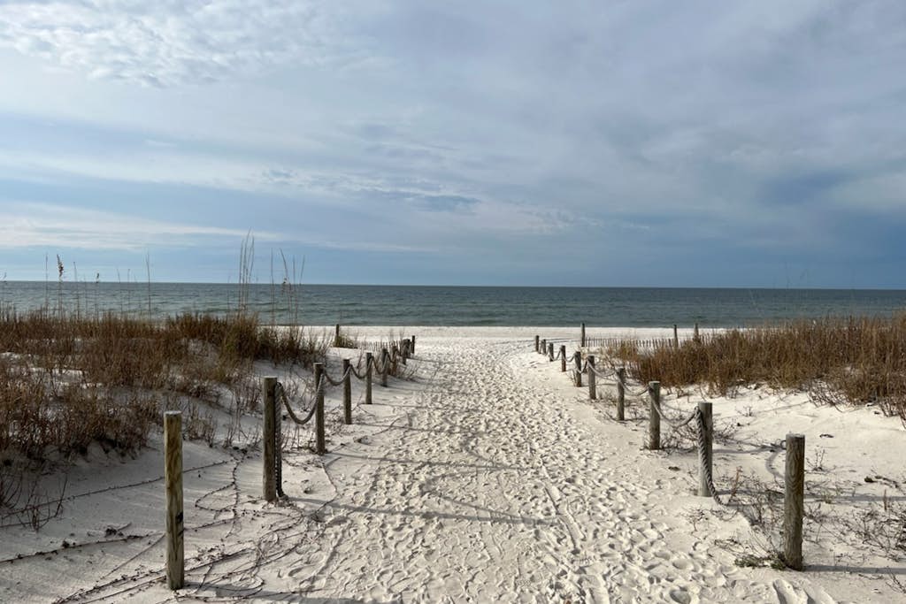 Waterfront condo with pool, hot tub, furnished lanai, fireplace & chic furniture