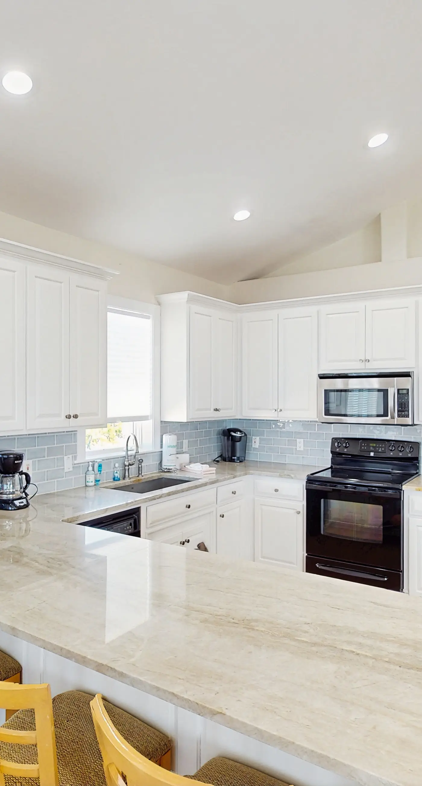 Beachfront home with a pool, game room, deck, grill, washer&dryer & central AC