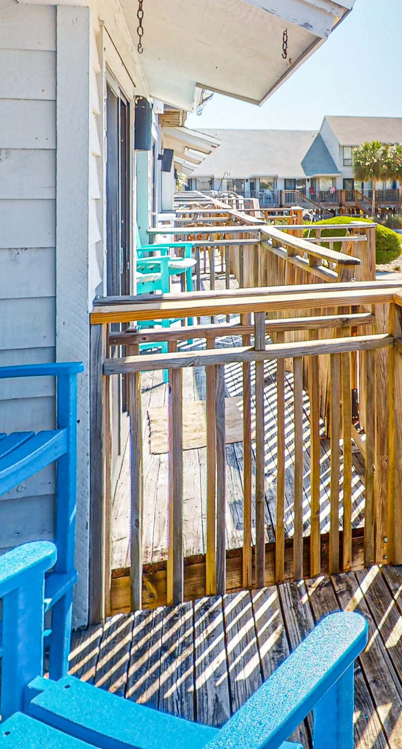 Dog-friendly, poolside townhouse w/community pool, grills, deck, beach gear, AC