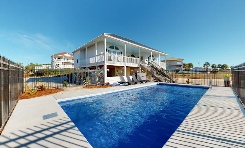 Dog-friendly charmer near the Gulf with private salt water pool, W/D, deck & AC
