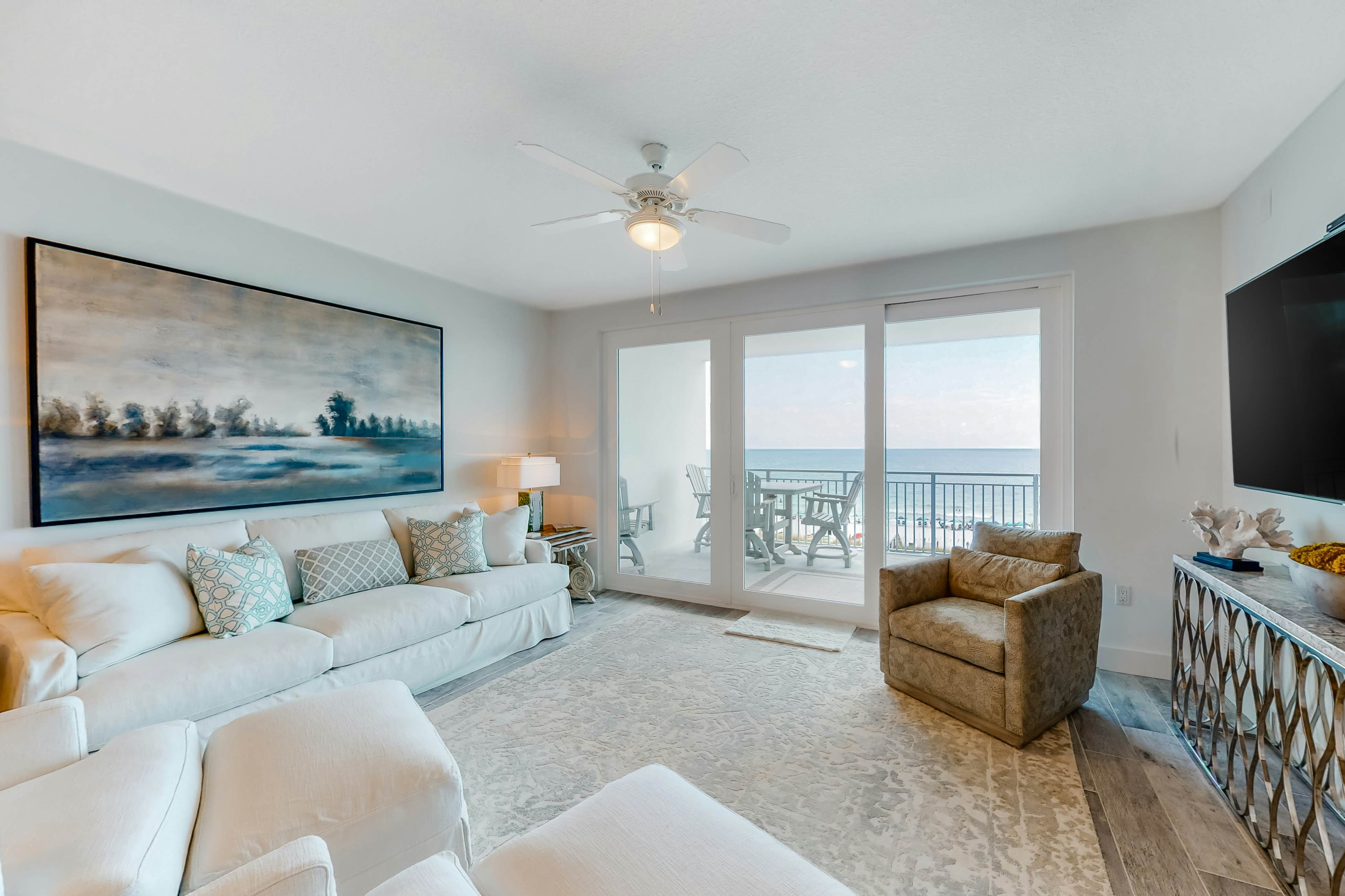 Fourth floor oceanfront condo with ocean views, private W&D, and central AC