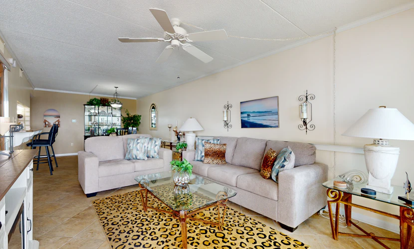 Gulf-front condo with views, beach access, pool, balcony, & fitness room