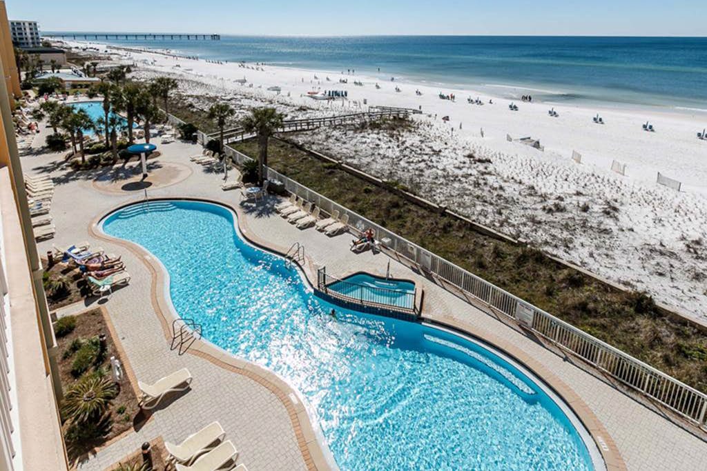 Gorgeous beachfront condo, private balcony, shared pool and beach access