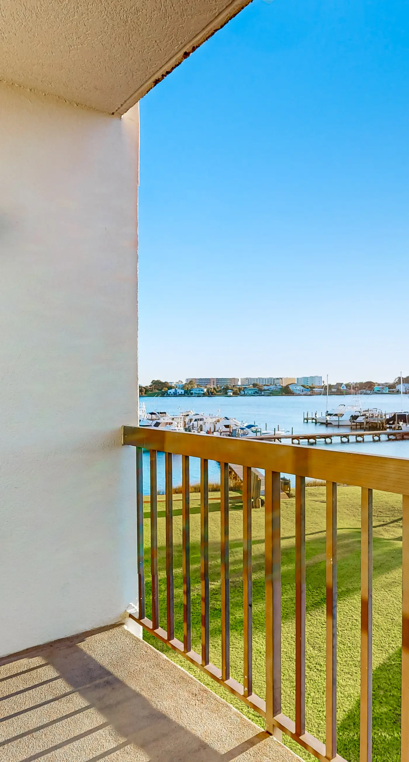 Inviting bayfront suite with water views, picnic area & pool