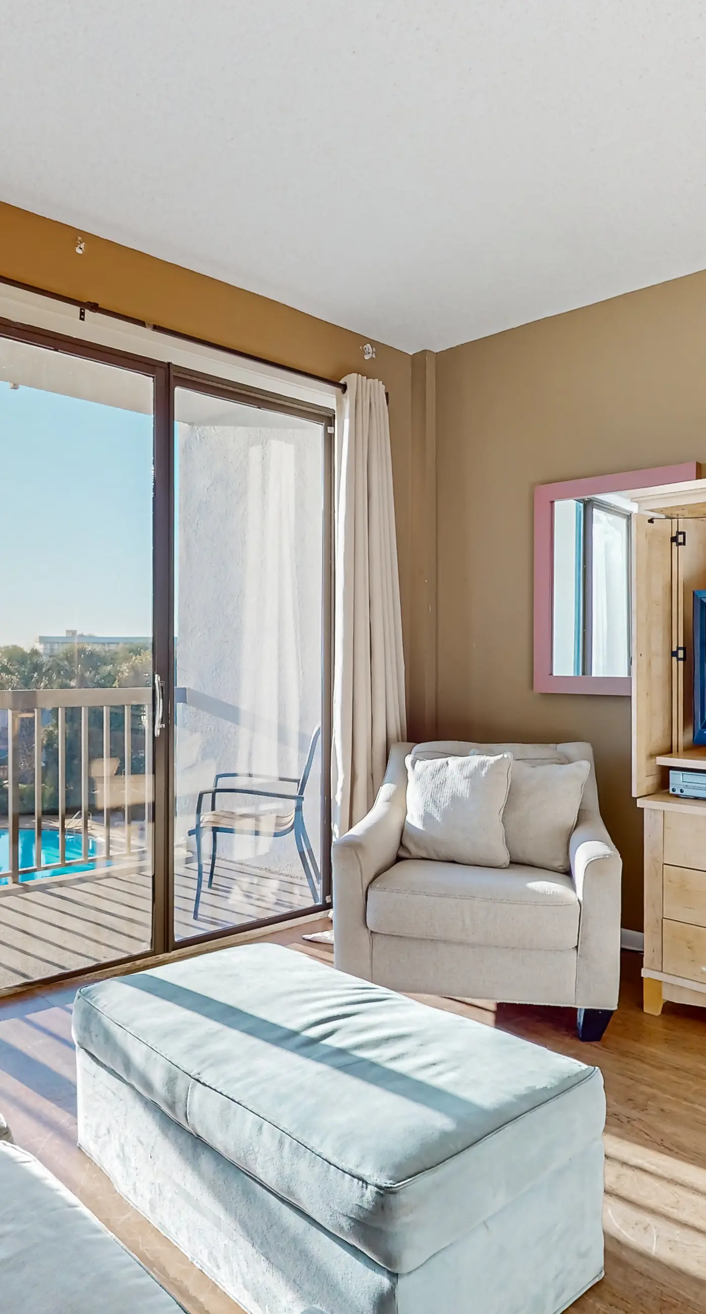 Inviting bayfront suite with water views, picnic area & pool