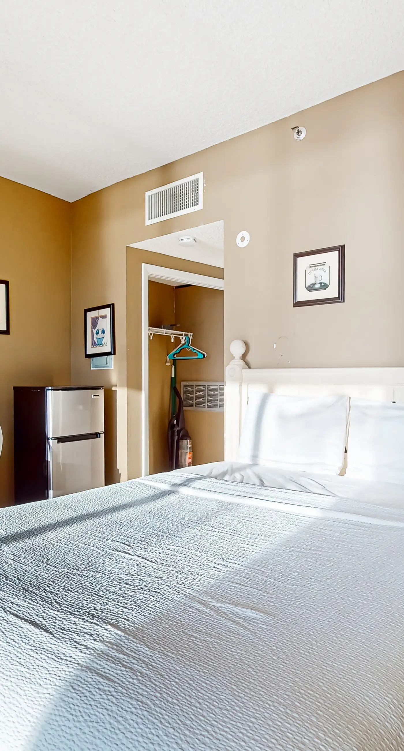 Inviting bayfront suite with water views, picnic area & pool
