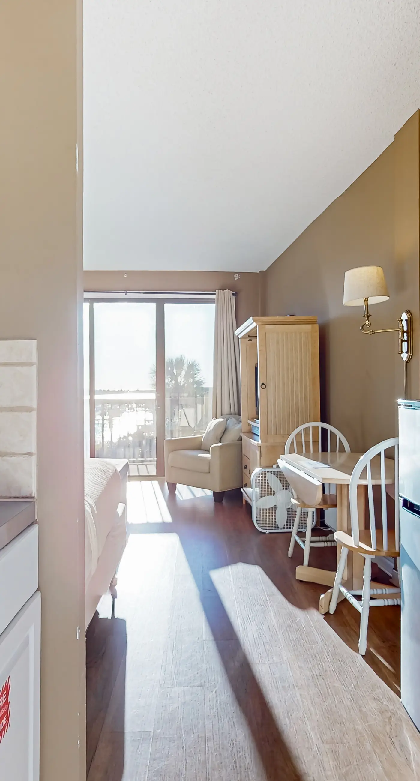 Inviting bayfront suite with water views, picnic area & pool