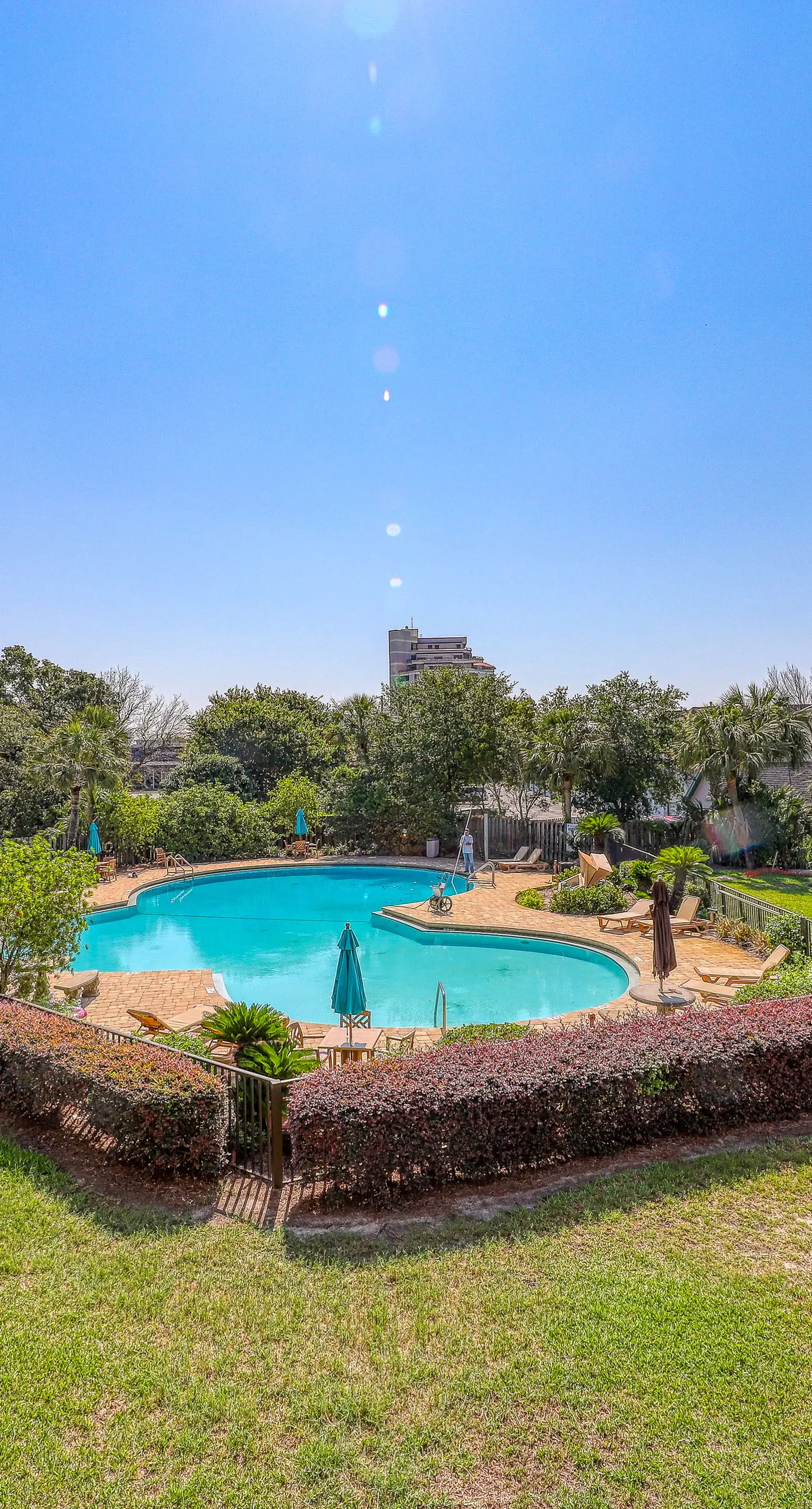 Inviting bayfront suite with water views, picnic area & pool