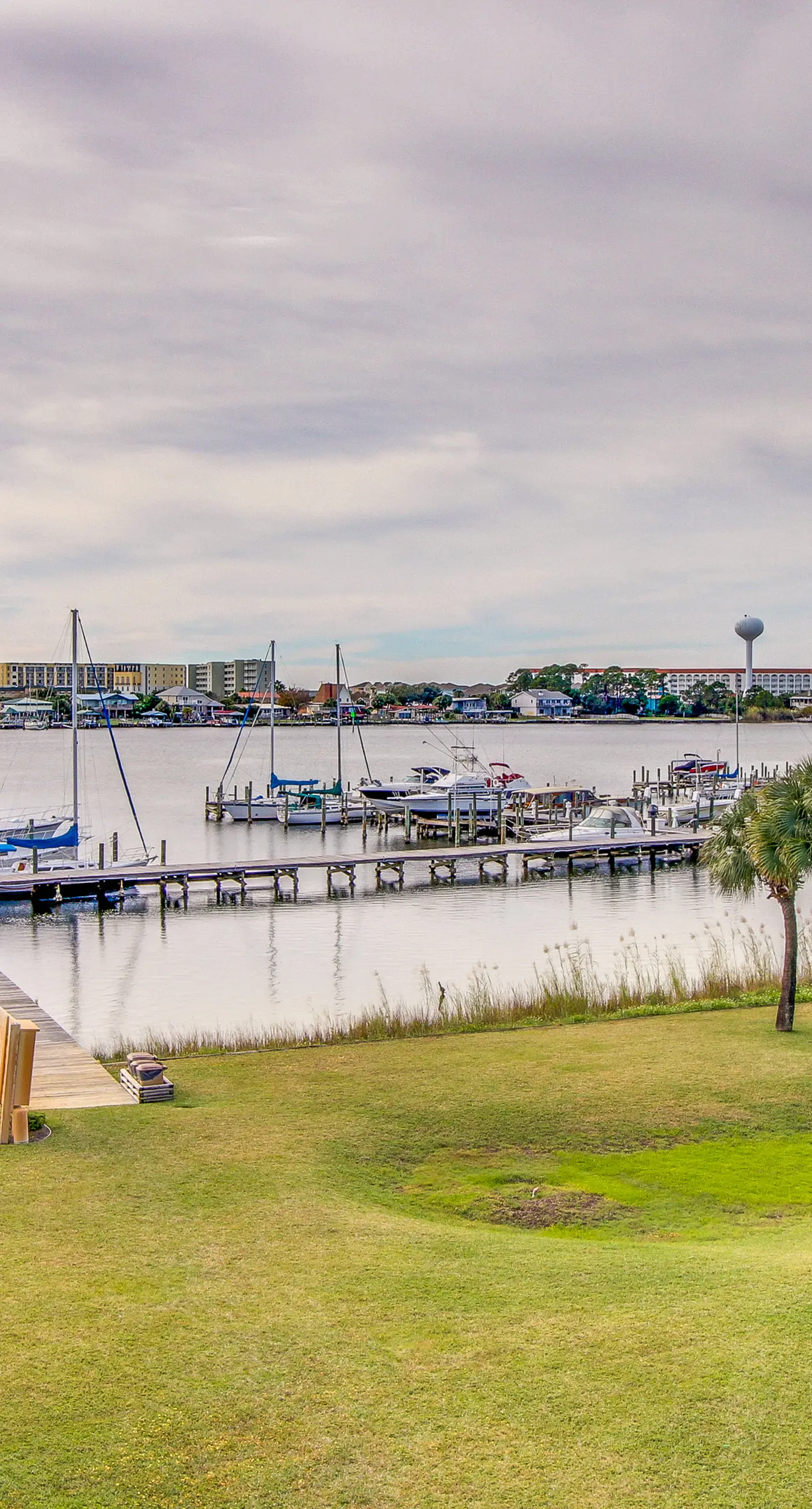 Inviting bayfront suite with water views, picnic area & pool