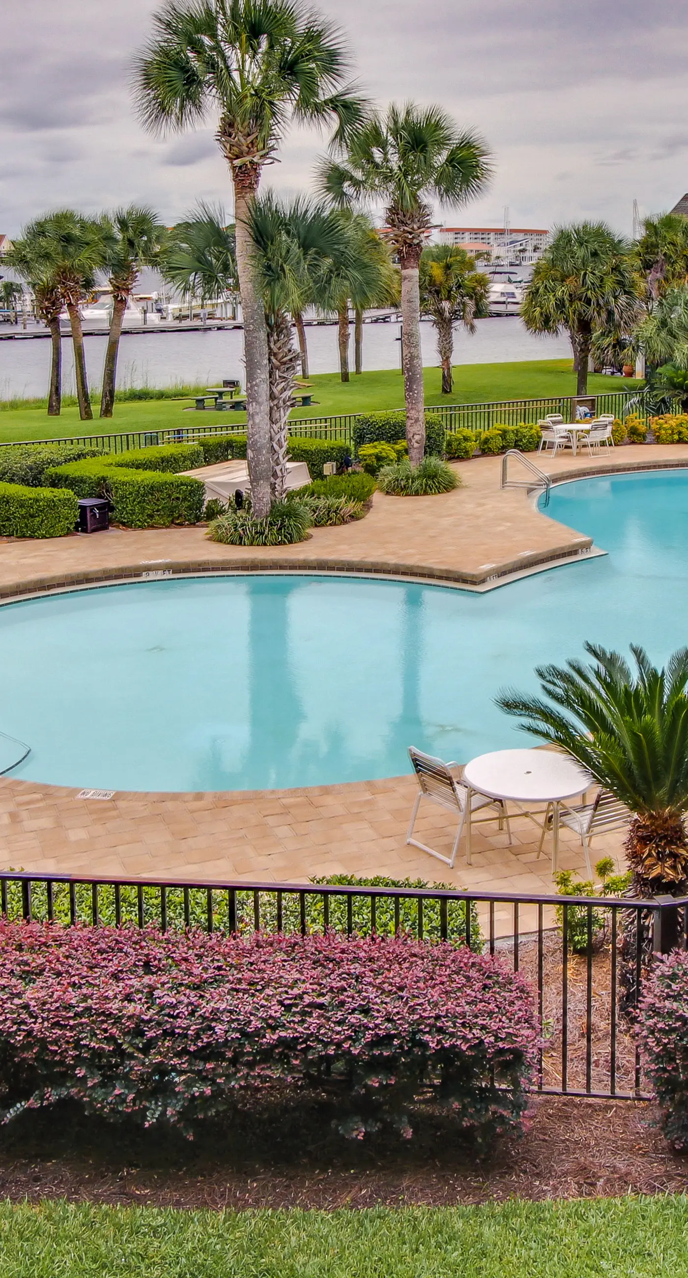 Bayfront delight with pool, bay views & prime location - snowbird-friendly