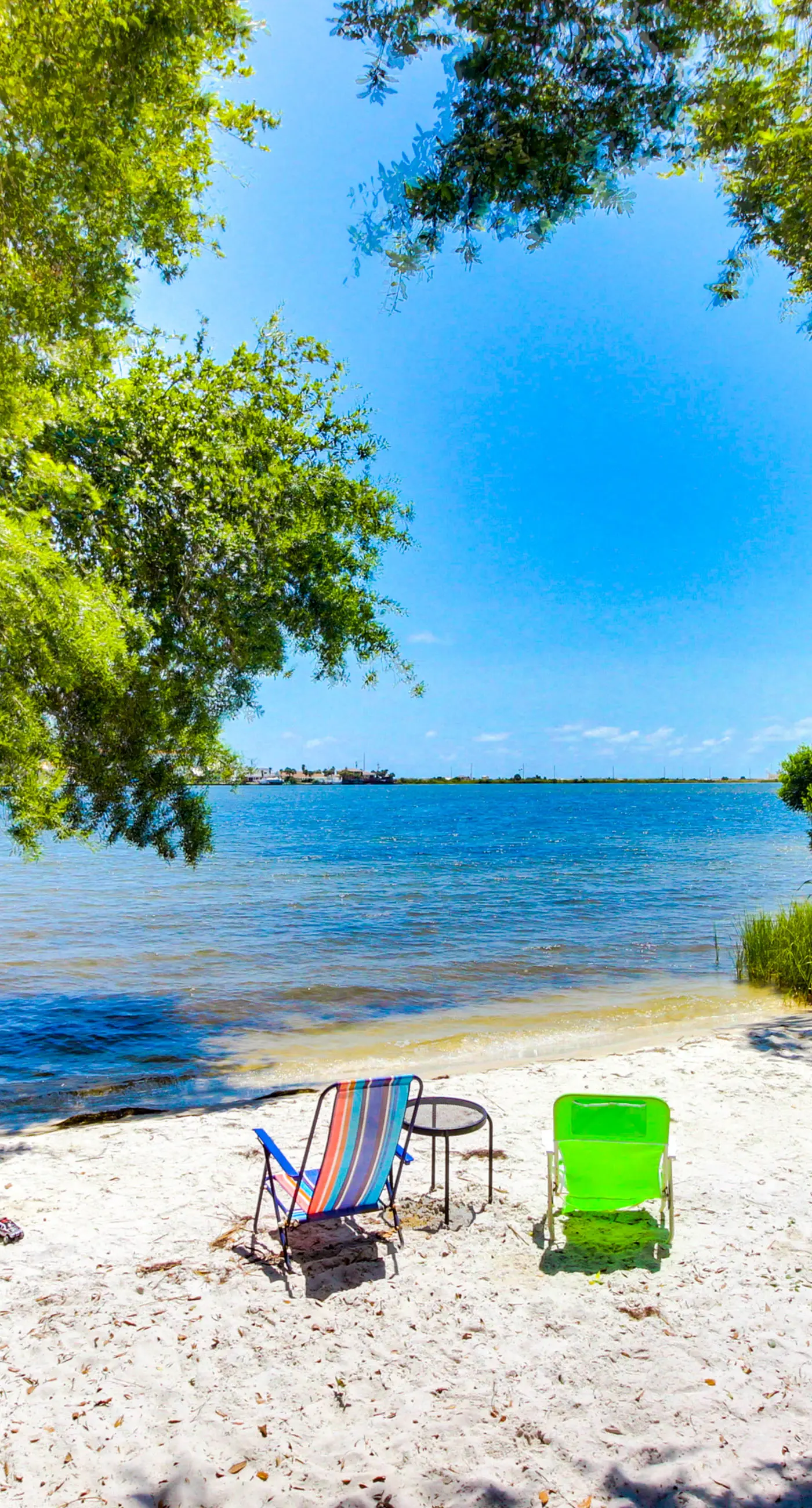 Bayfront delight with pool, bay views & prime location - snowbird-friendly