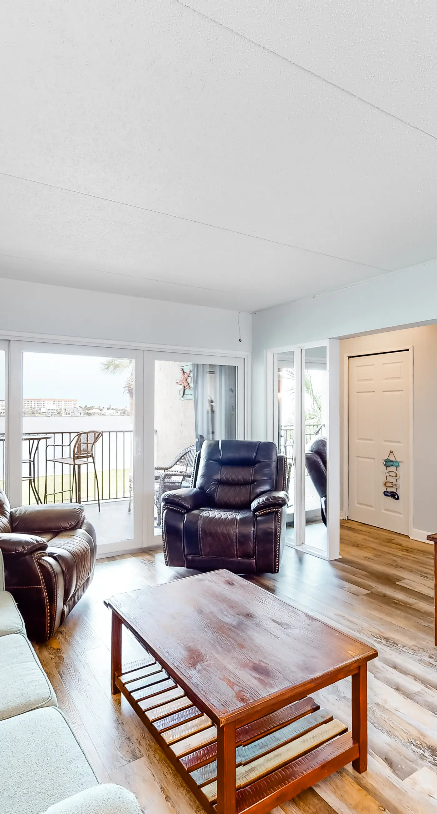 Waterfront condo with pool, central AC, washer/dryer, and WiFi