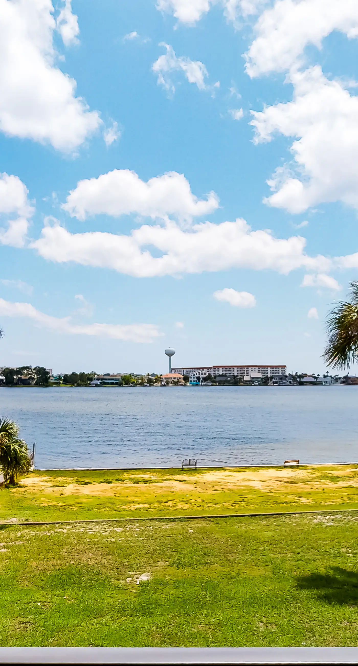 Waterfront condo with pool, central AC, washer/dryer, and WiFi