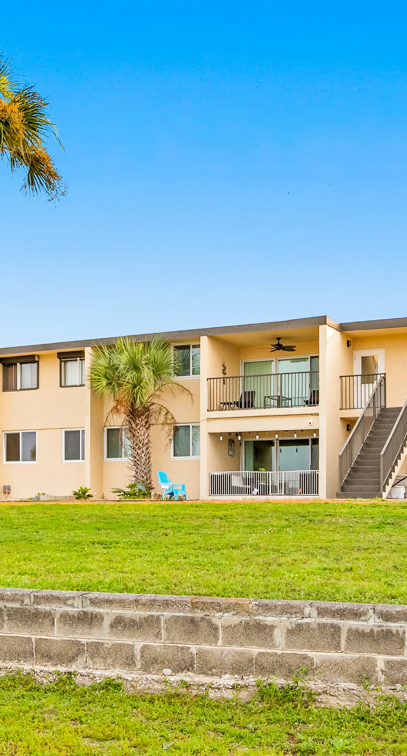 Waterfront condo with pool, central AC, washer/dryer, and WiFi