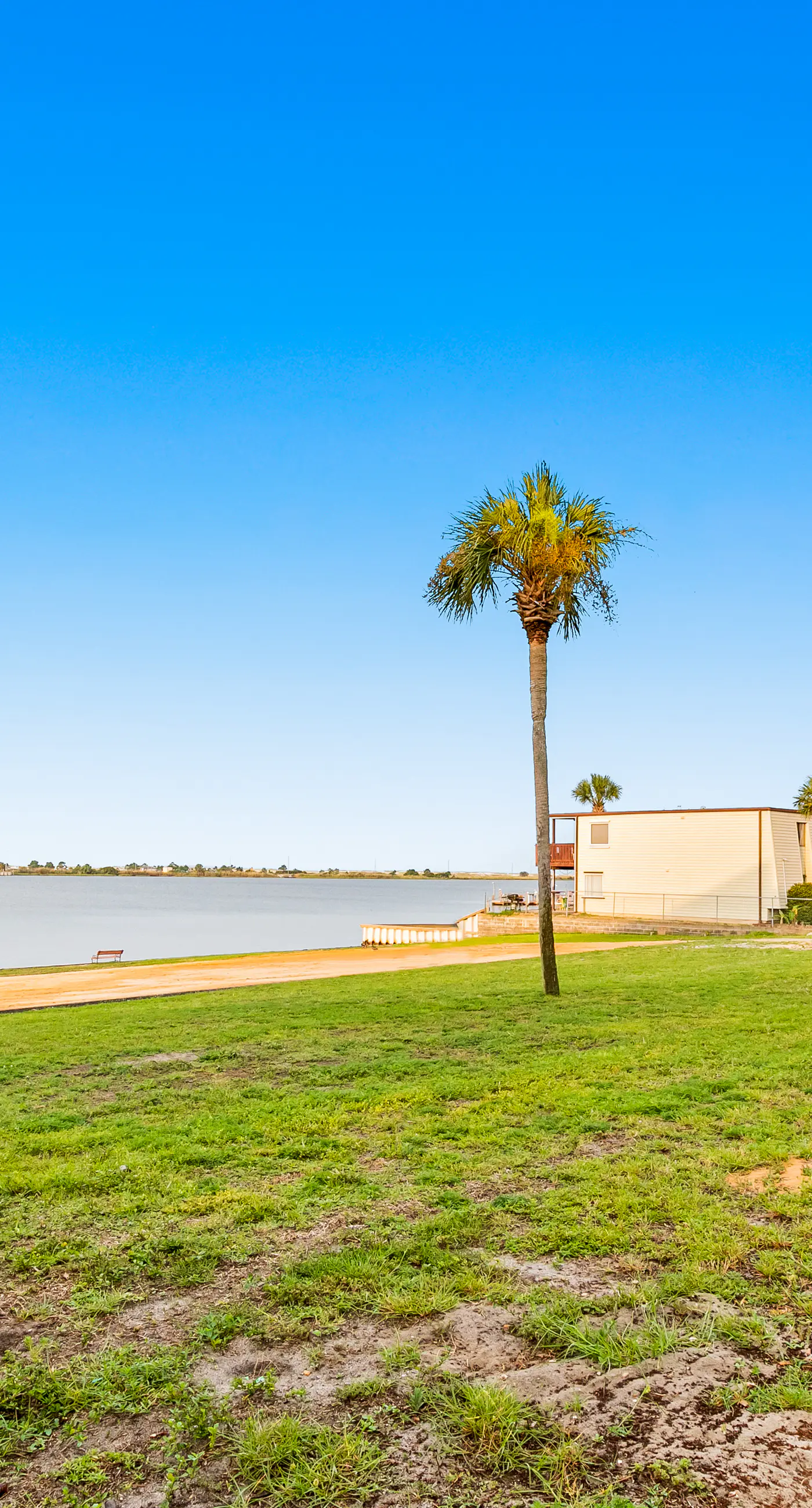 Waterfront condo with pool, central AC, washer/dryer, and WiFi