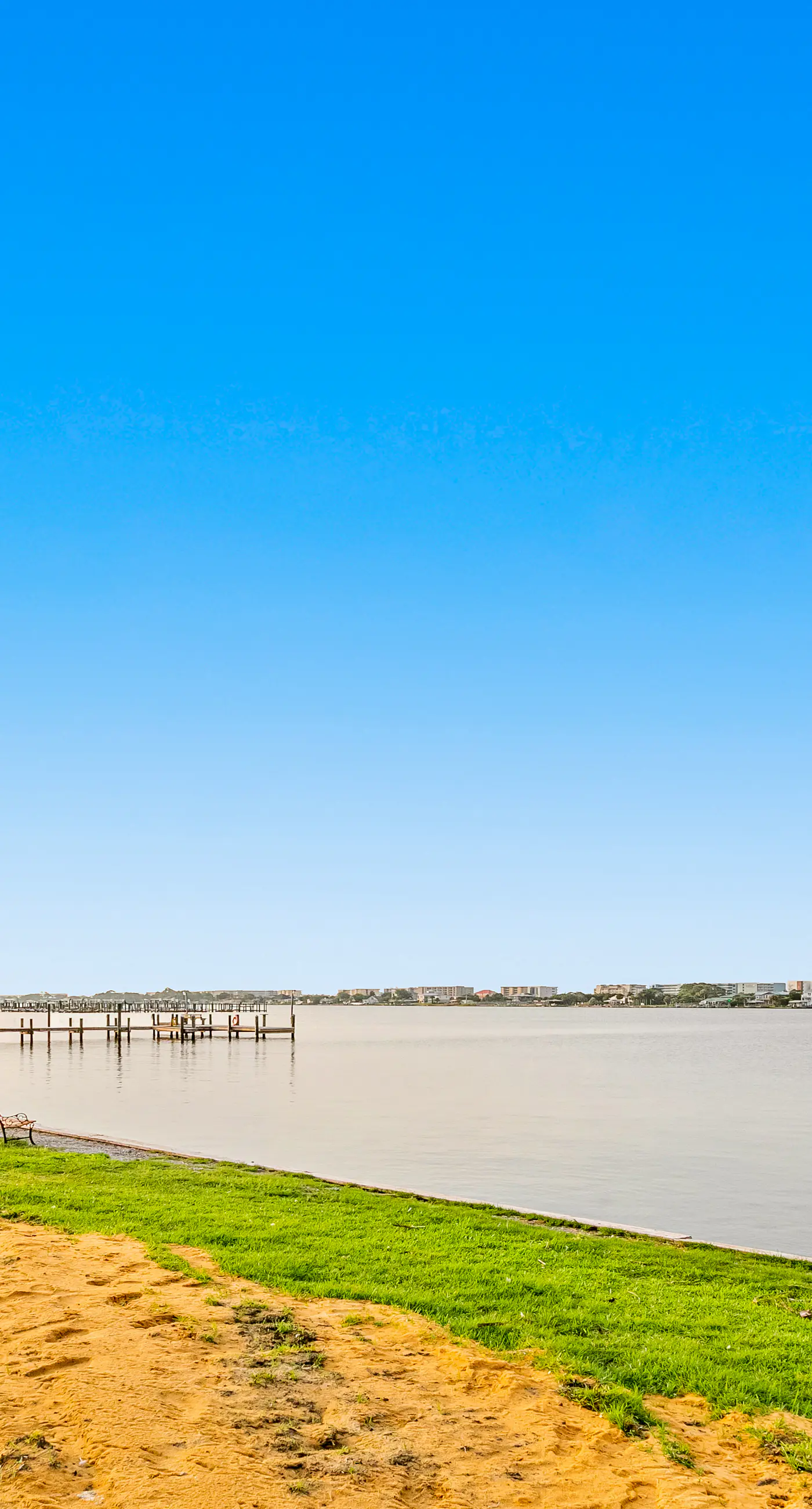 Waterfront condo with pool, central AC, washer/dryer, and WiFi