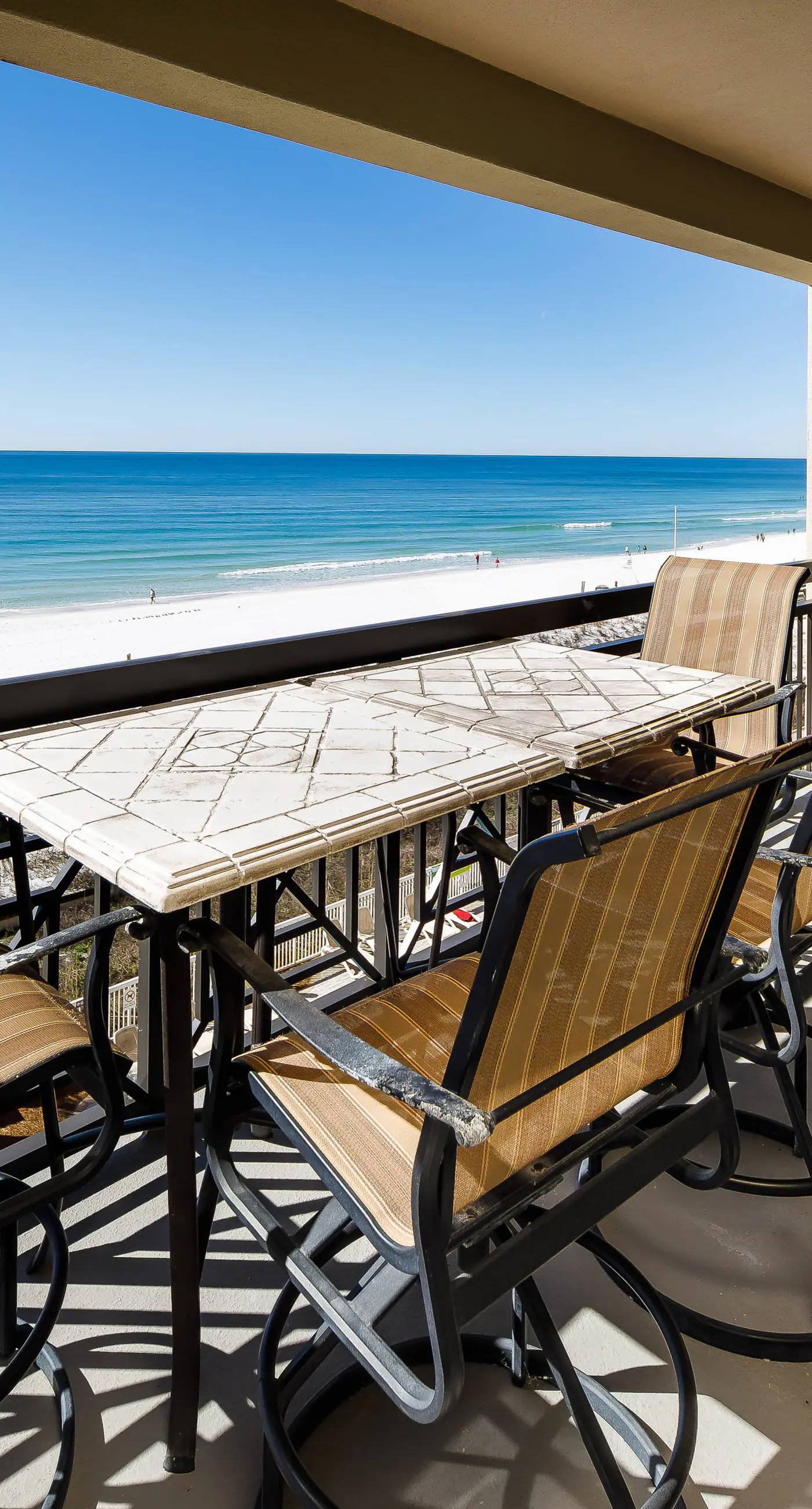 Gulf-view condo with beachfront access, pool, hot tub, gym, AC, & washer&dryer