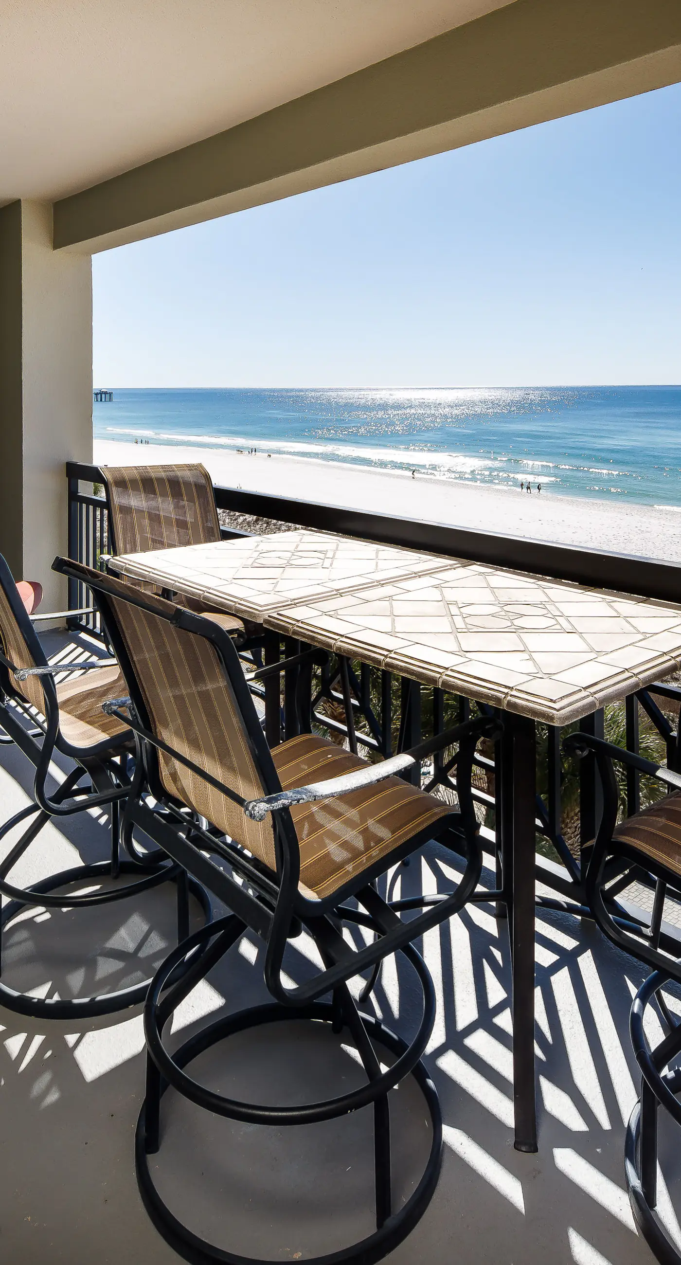 Gulf-view condo with beachfront access, pool, hot tub, gym, AC, & washer&dryer